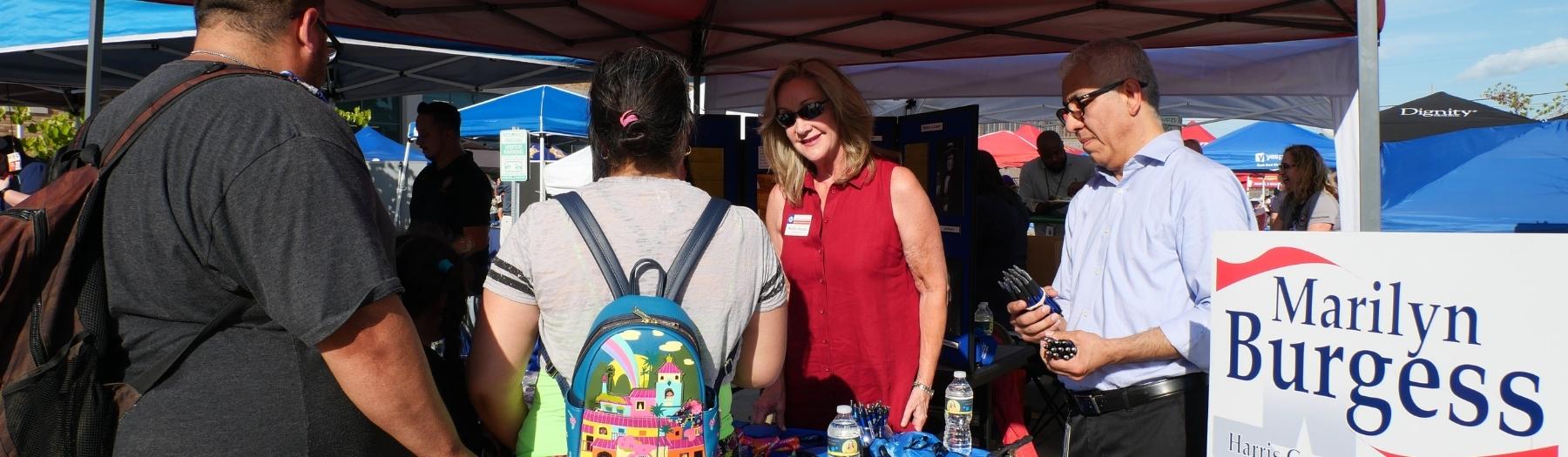image showing the summer of 2022, District Clerk Marilyn Burgess participated in a community outreach event organized by Harris County Precinct 6 Constable Silvia Trevino