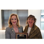 Harris County District Clerk Marilyn Burgess receives the G. Thomas Munsterman Award for Jury Innovation from Paula Hannaford, director of the Center for Jury Studies at the National Center for State Courts.